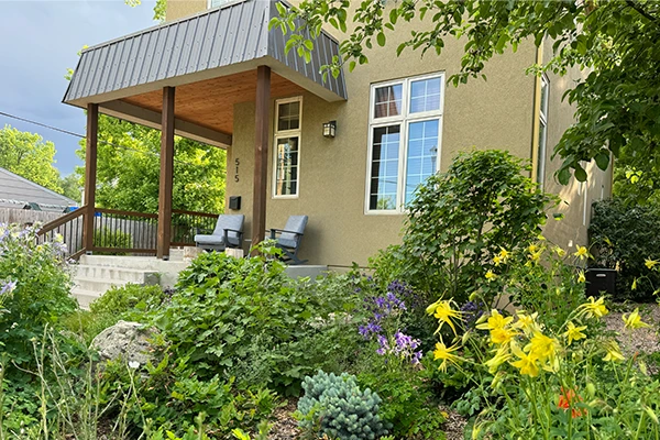 Native garden design and installation by a porch in Northern Colorado by Blue Spruce Horticulture.