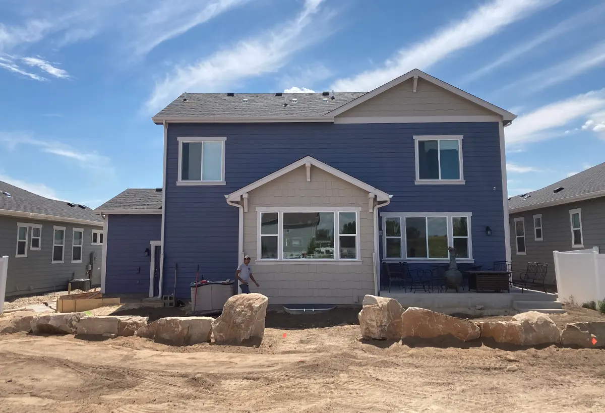 Blue Spruce Horticulture enhanced the Boxwood Drive Project in Windsor, Colorado with xeriscape, modern architecture, and a low maintenance garden.