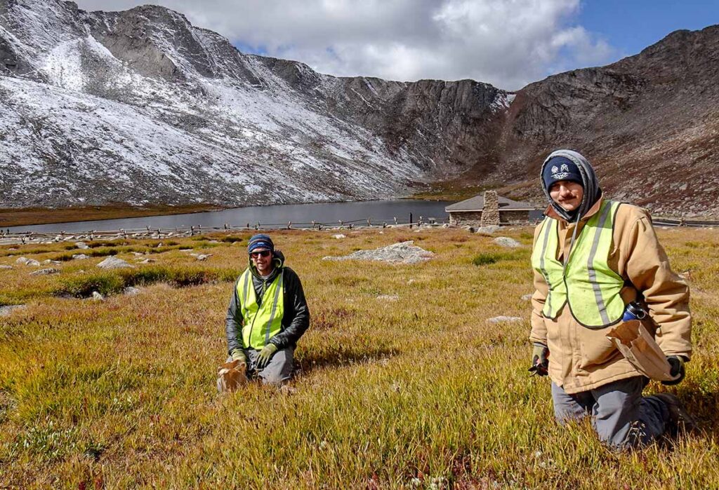 Workers in mountain range